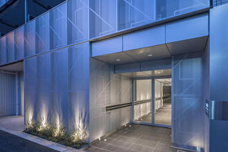 Graphic aluminum perforated metal of balcony and entrance for an apartment 